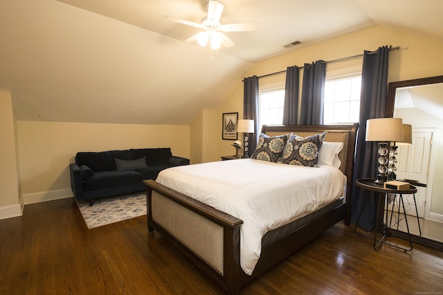 bedroom featuring dark wood-type flooring, ceiling fan, and lofted ceiling