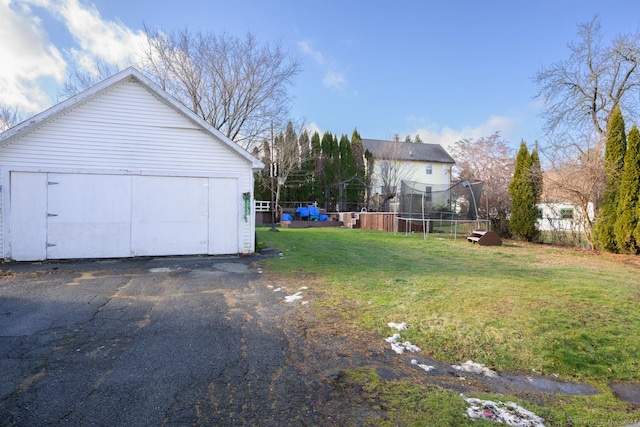 view of yard with a trampoline