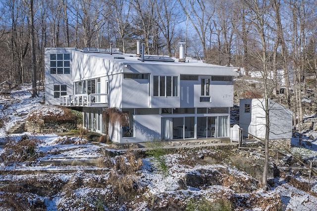 view of snow covered property