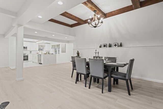 dining room with beamed ceiling, light hardwood / wood-style floors, and a chandelier