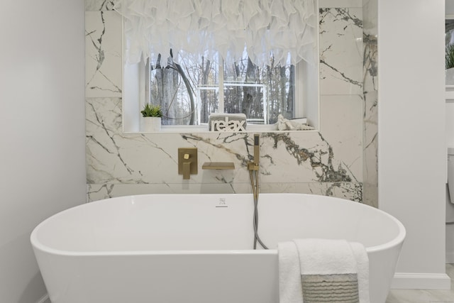 bathroom featuring a bathing tub