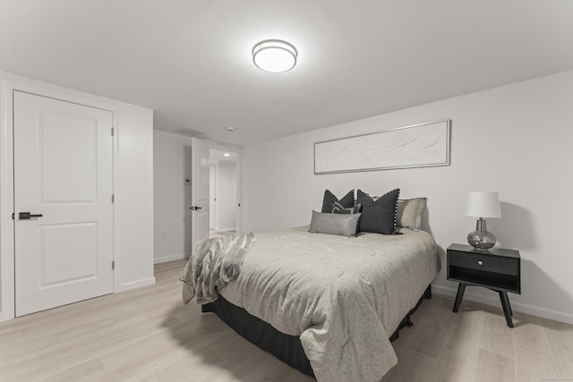 bedroom featuring light hardwood / wood-style flooring