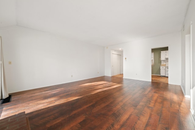 empty room with dark hardwood / wood-style floors