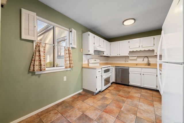 kitchen with light tile patterned flooring, white appliances, white cabinetry, and sink