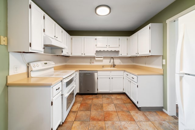 kitchen with white cabinetry, light tile patterned flooring, white appliances, and sink