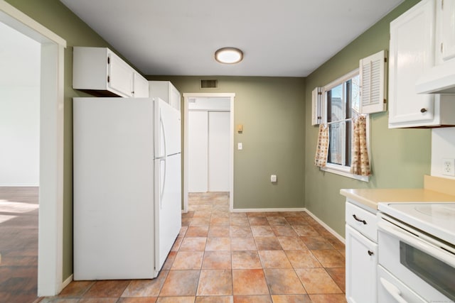 kitchen featuring white cabinets, white appliances, ventilation hood, and light tile patterned flooring