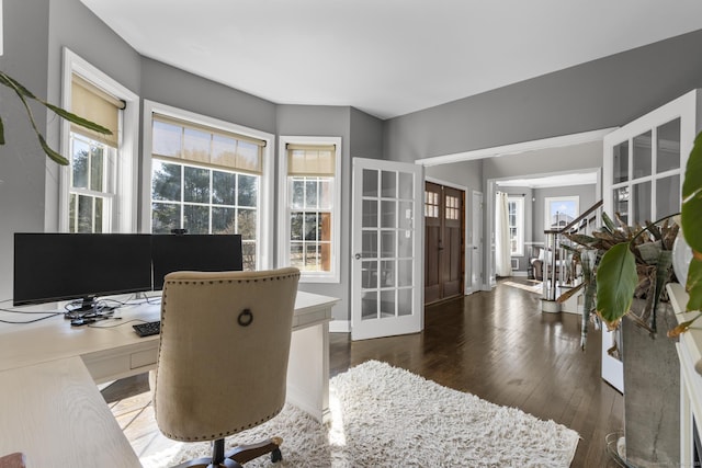 office with french doors, baseboards, and hardwood / wood-style floors