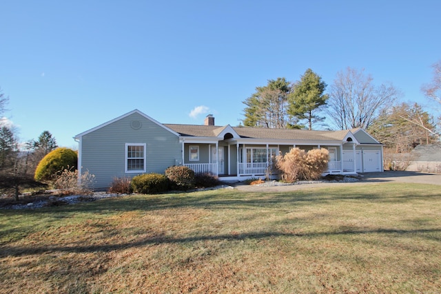 ranch-style house featuring a porch, a garage, and a front lawn