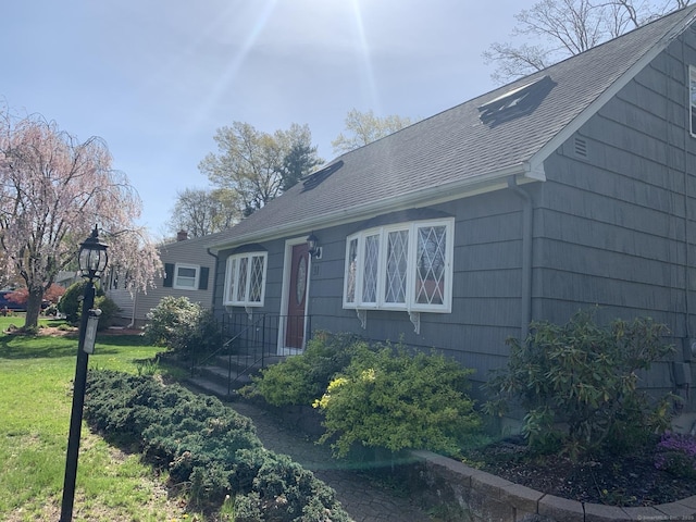 31 Gary Dr, Enfield, CT 06082 - ranch-style home featuring roof with shingles and a front lawn