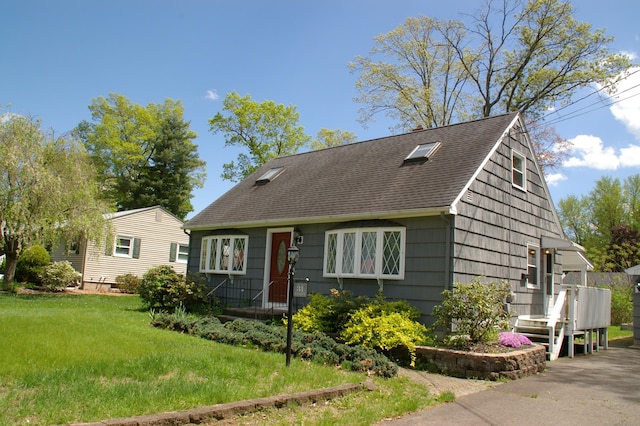 31 Gary Dr, Enfield, CT 06082 - new england style home with a shingled roof and a front lawn