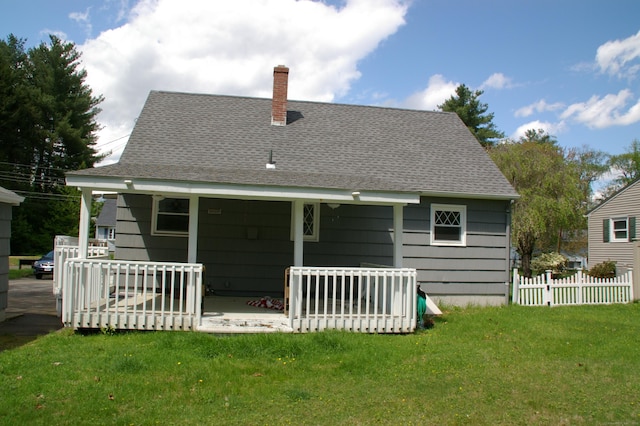 31 Gary Dr, Enfield, CT 06082 - rear view of property featuring a chimney and roof with shingles