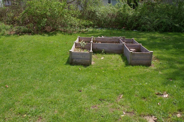 31 Gary Dr, Enfield, CT 06082 - view of grassy yard featuring a vegetable garden
