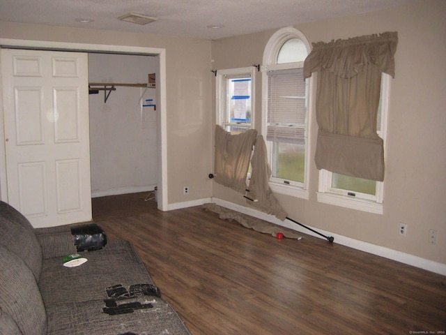 interior space with dark hardwood / wood-style floors