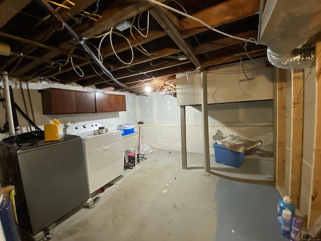 basement with separate washer and dryer