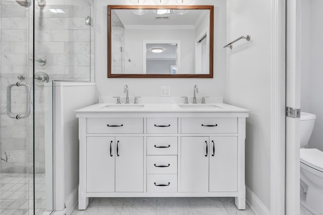 bathroom with walk in shower, toilet, vanity, and ornamental molding