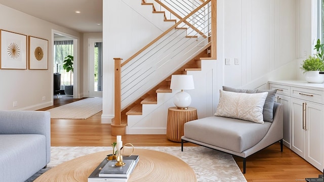 living room with light hardwood / wood-style flooring