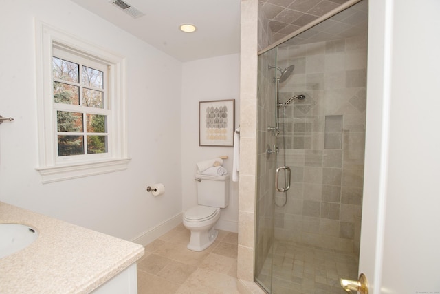 full bath with visible vents, baseboards, toilet, a stall shower, and vanity