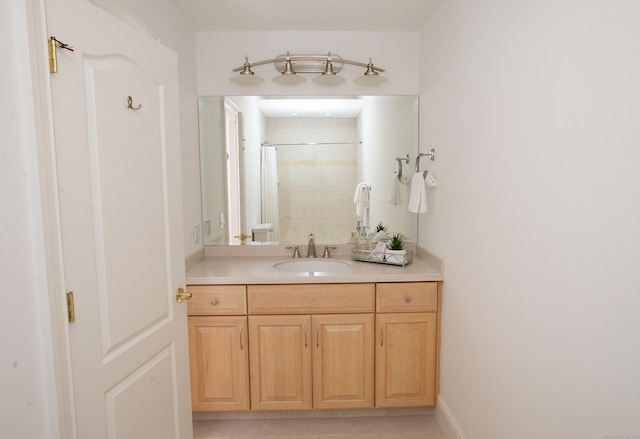 full bath featuring curtained shower, baseboards, and vanity