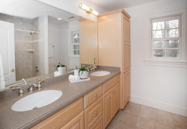 266 Great Plain Rd, Danbury, CT 06811 - full bathroom featuring double vanity, tile patterned flooring, and tiled shower