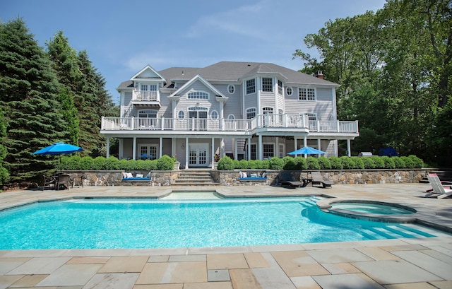 266 Great Plain Rd, Danbury, CT 06811 - view of pool featuring french doors, a patio area, and a pool with connected hot tub
