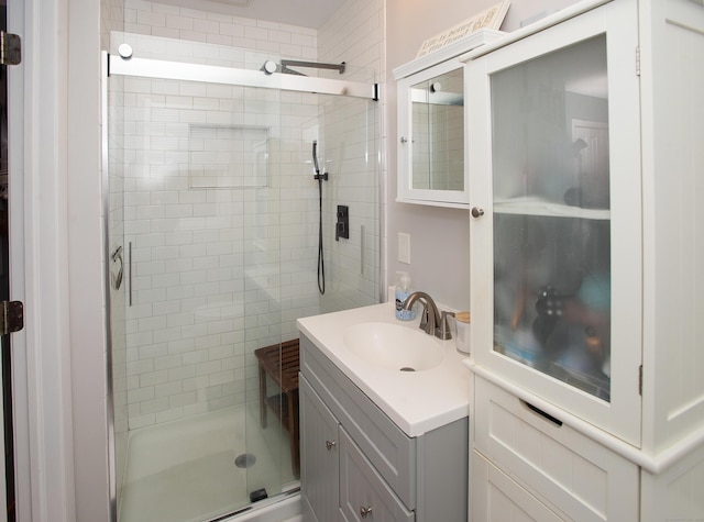 bathroom with vanity and walk in shower