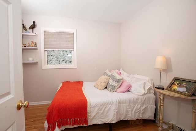 bedroom featuring hardwood / wood-style flooring