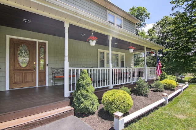 property entrance featuring covered porch