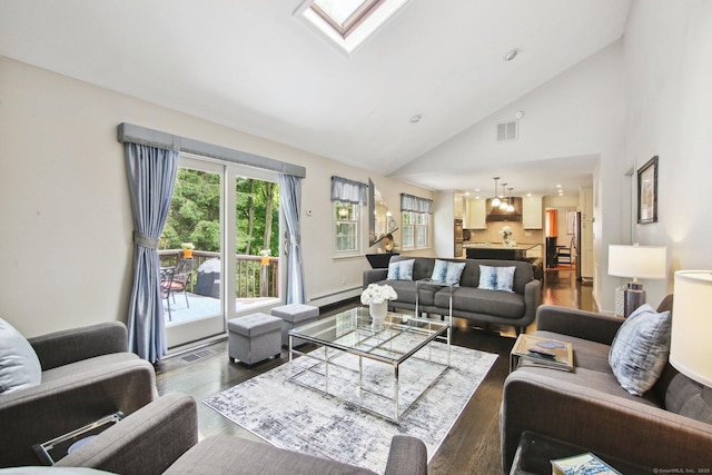 living room with dark hardwood / wood-style flooring, a skylight, high vaulted ceiling, and baseboard heating