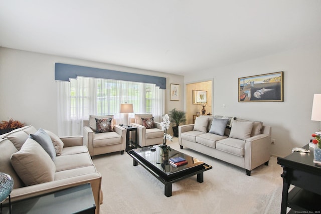 living room featuring light carpet