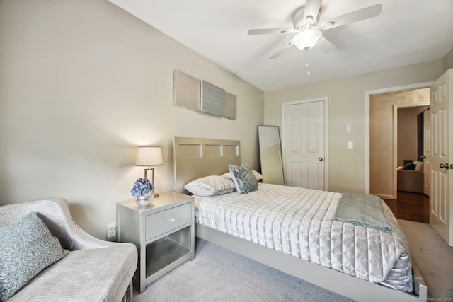 carpeted bedroom featuring ceiling fan