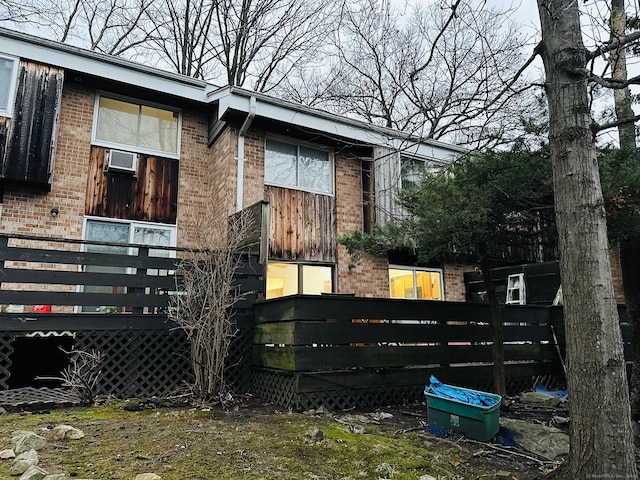 back of house with cooling unit