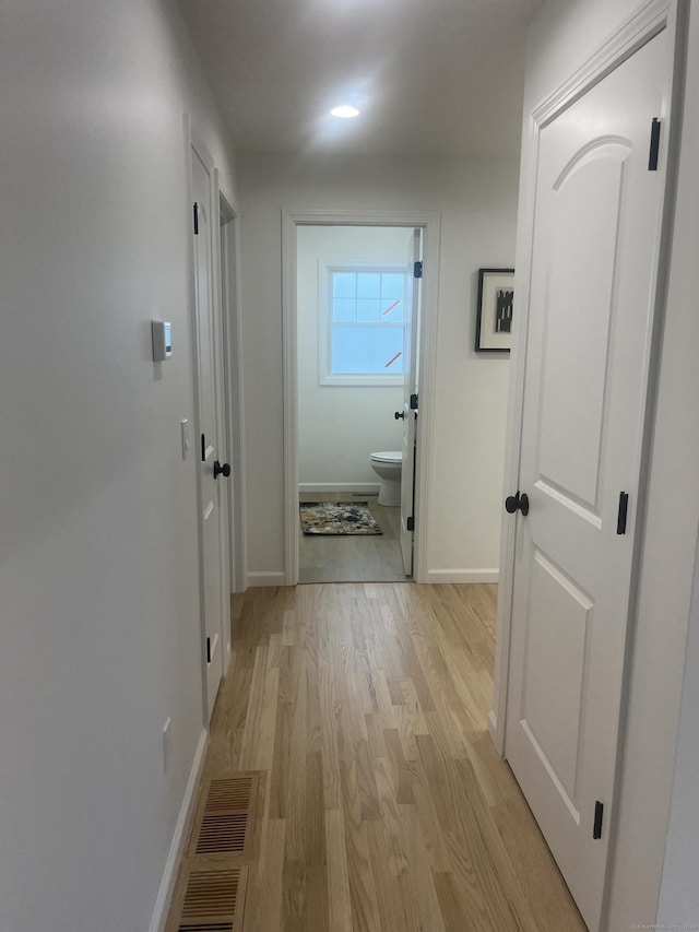 hall featuring light hardwood / wood-style flooring