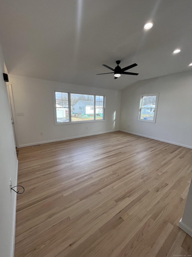 unfurnished room featuring ceiling fan and light hardwood / wood-style floors