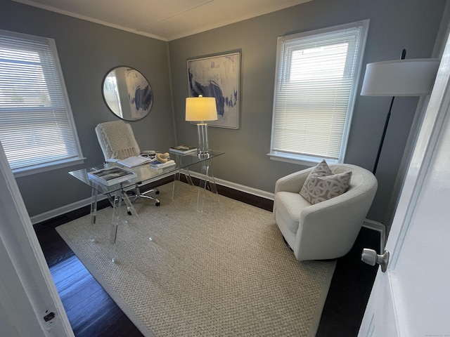 home office with hardwood / wood-style flooring and crown molding