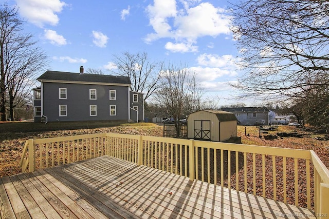 deck featuring a shed