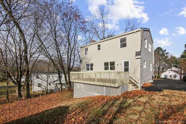 rear view of house with a deck