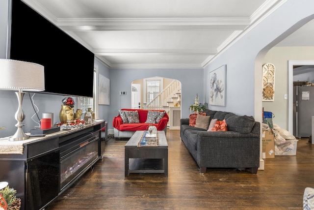 living room featuring dark hardwood / wood-style floors and crown molding