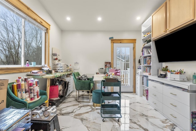 interior space featuring a wealth of natural light and light brown cabinetry