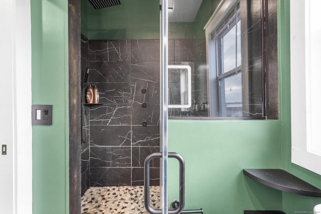 bathroom featuring walk in shower