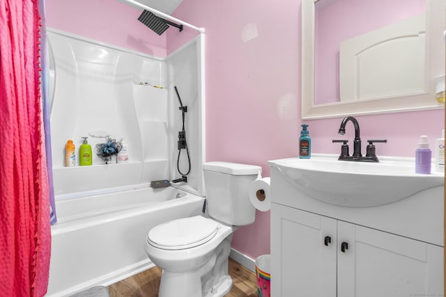 full bathroom with shower / bath combination with curtain, vanity, wood-type flooring, and toilet