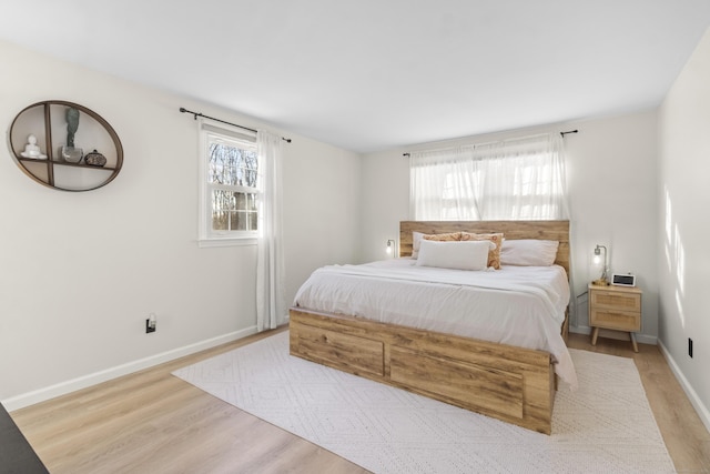 bedroom featuring light hardwood / wood-style flooring