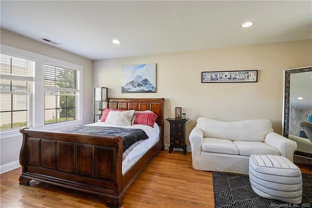 bedroom with light wood-type flooring