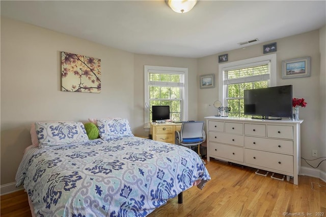 bedroom featuring light hardwood / wood-style floors