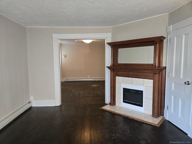 unfurnished living room with a textured ceiling, dark hardwood / wood-style floors, a fireplace, and a baseboard heating unit