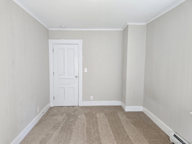 unfurnished room featuring carpet, baseboard heating, and crown molding