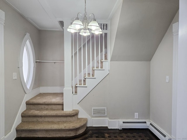 stairs featuring a chandelier and a baseboard radiator