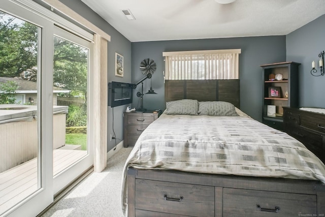 72 Providence Ave, Shelton, CT 06484 - bedroom with multiple windows, carpet flooring, and access to outside