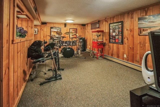 72 Providence Ave, Shelton, CT 06484 - exercise area with wooden walls, a textured ceiling, and baseboard heating