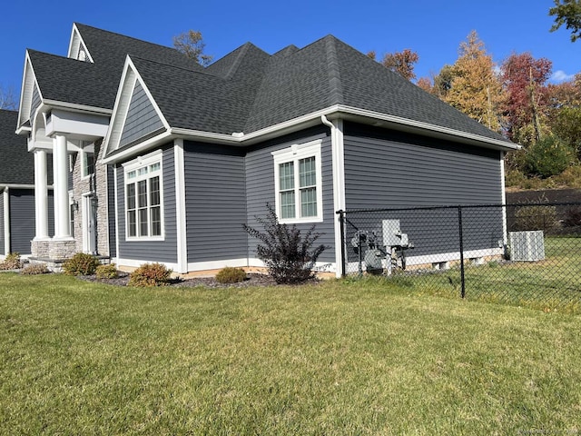 view of property exterior with a yard