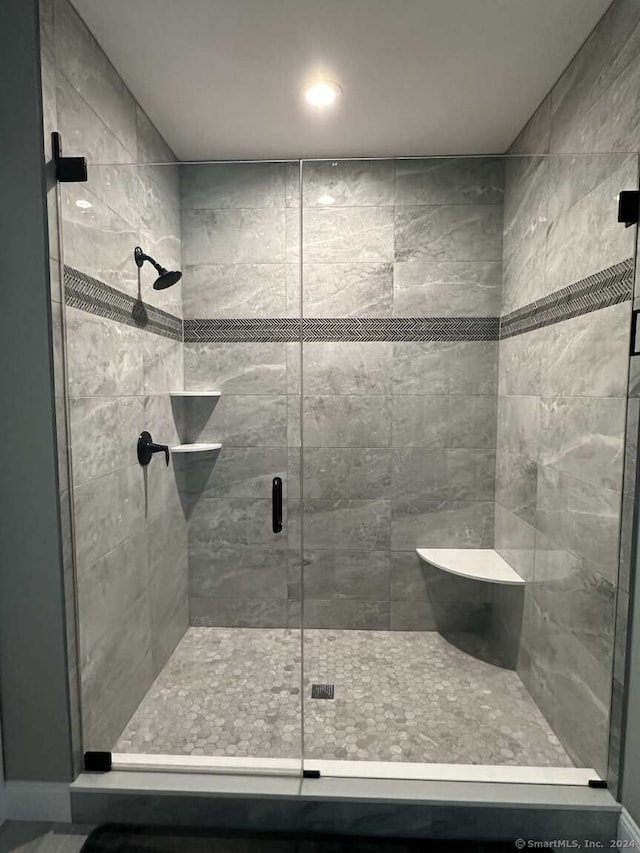 bathroom with an enclosed shower